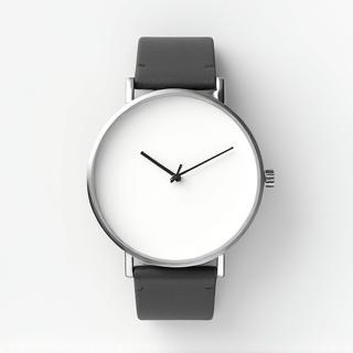 Example of a minimalist watch with a white dial and simple hands